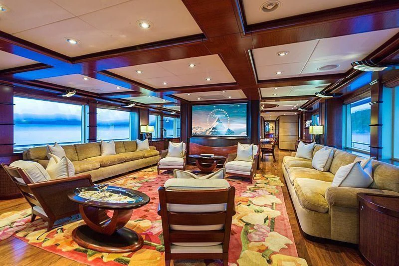 a living room with a large screen aboard USHER Yacht for Sale