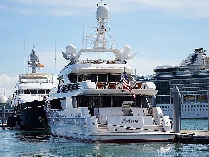 a couple of large boats in the water aboard USHER Yacht for Sale