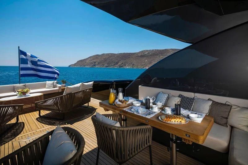 a table with food on it aboard SAINT Yacht for Sale