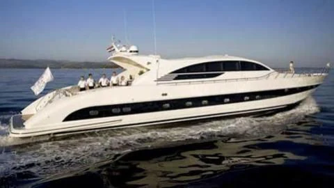 a white yacht on the water aboard SAINT Yacht for Sale