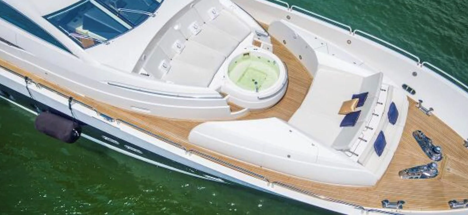 a large white boat aboard UNICO Yacht for Sale