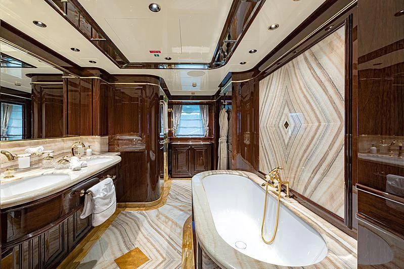 a bathroom with a large tub aboard LADY LENA Yacht for Sale