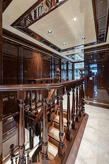 a large wooden library aboard LADY LENA Yacht for Sale