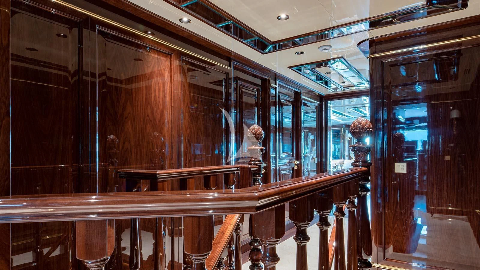a large room with wooden tables aboard LADY LENA Yacht for Sale