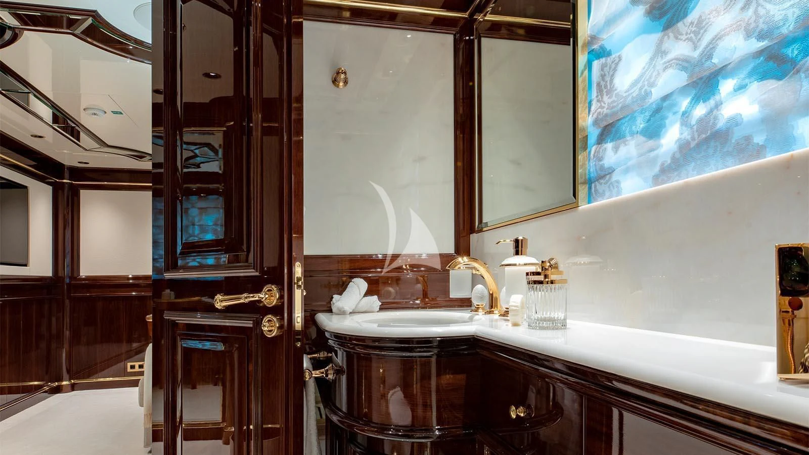 a bathroom with a sink and cabinets aboard LADY LENA Yacht for Sale