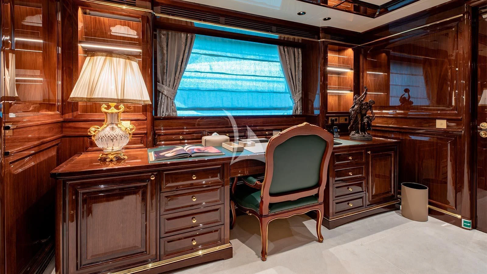 a room with a desk and a chair aboard LADY LENA Yacht for Sale
