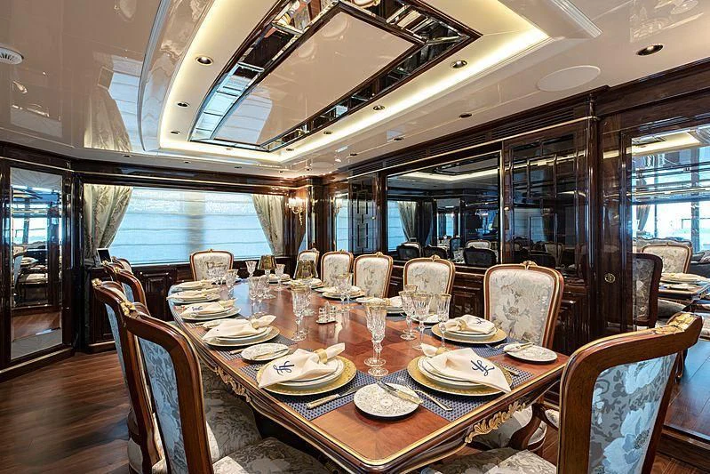 a dining table set for a meal aboard LADY LENA Yacht for Sale