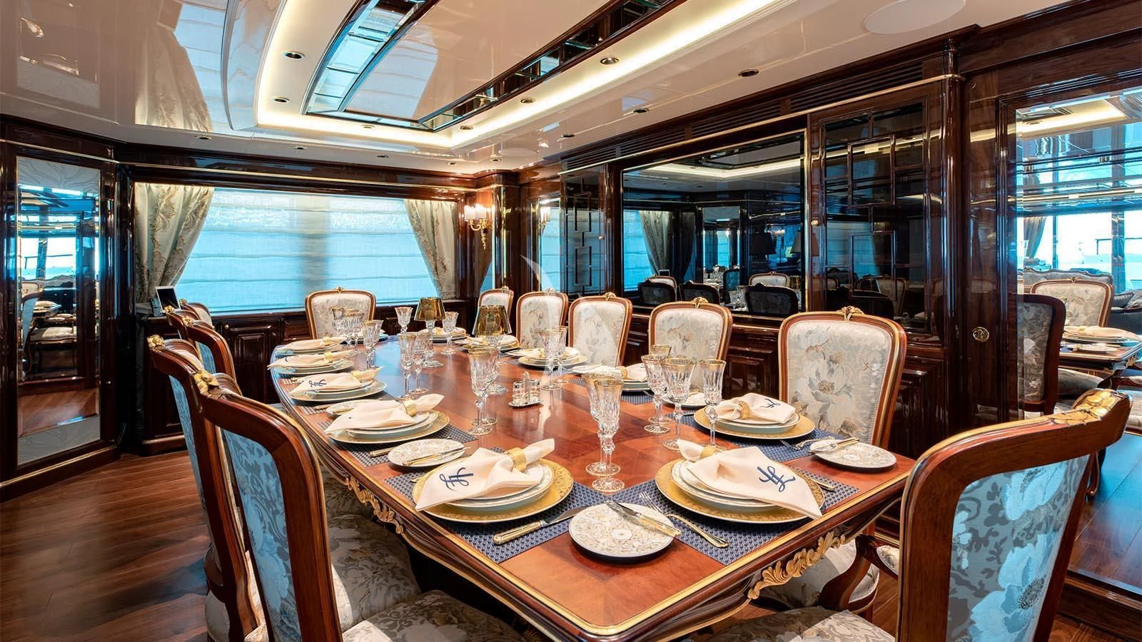 a dining table set for a meal aboard LADY LENA Yacht for Sale