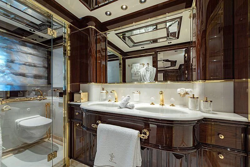 a bathroom with a large mirror aboard LADY LENA Yacht for Sale