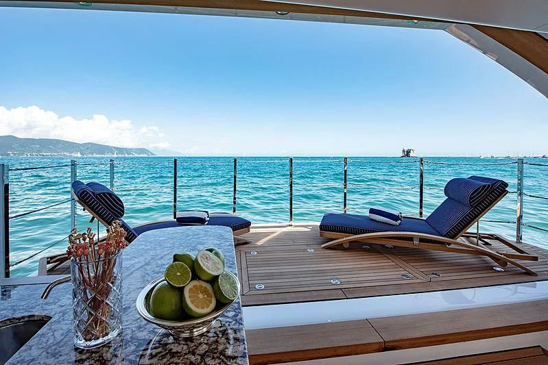 a table with fruit on it aboard LADY LENA Yacht for Sale