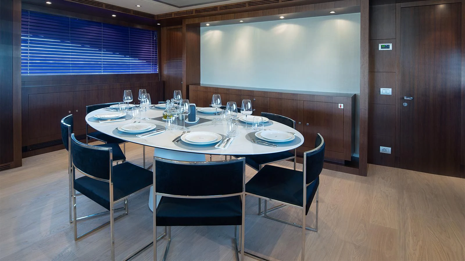 a table set for a dinner aboard BEYOND Yacht for Charter