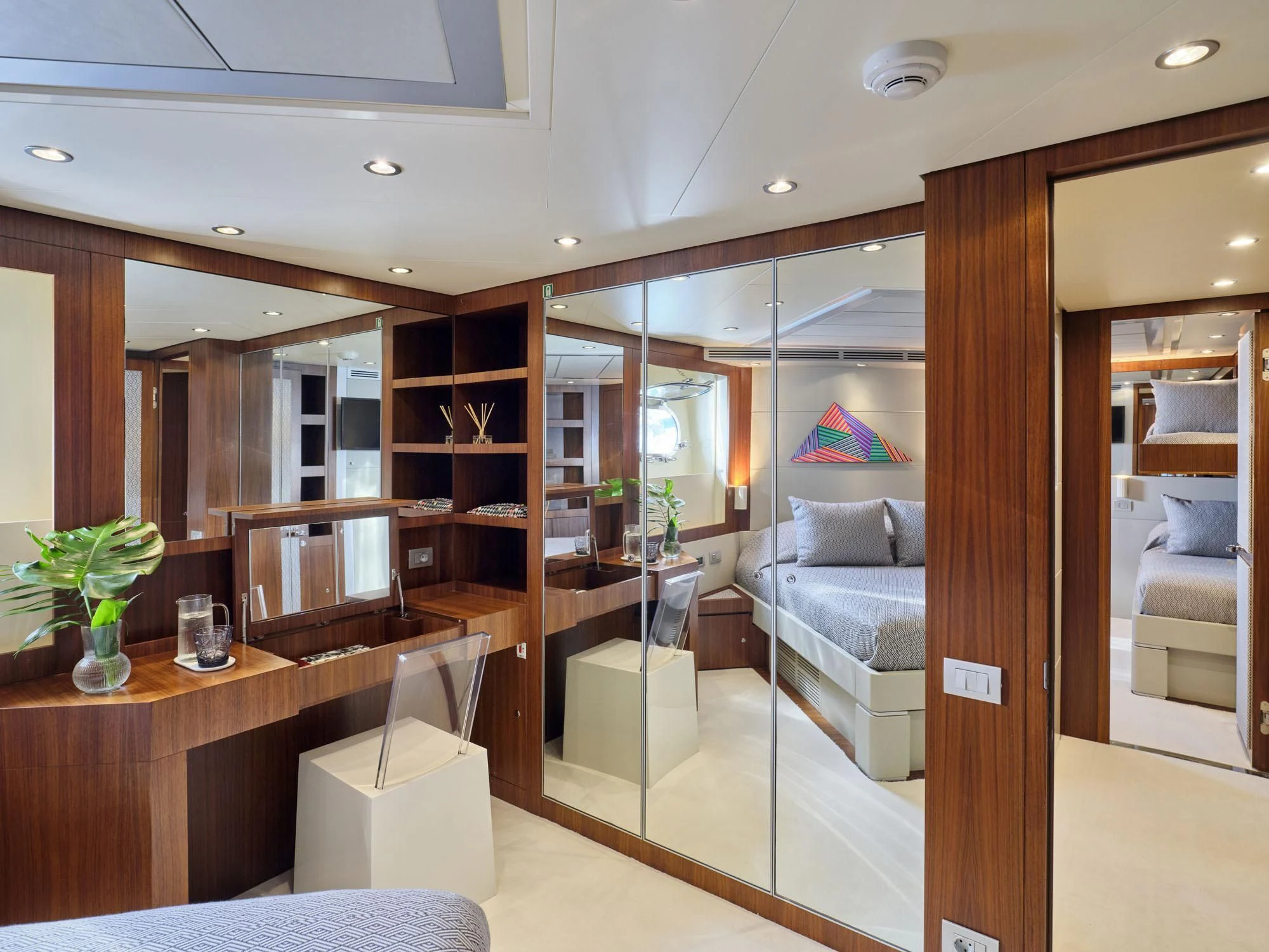 a room with a couch and a table aboard BEYOND Yacht for Charter