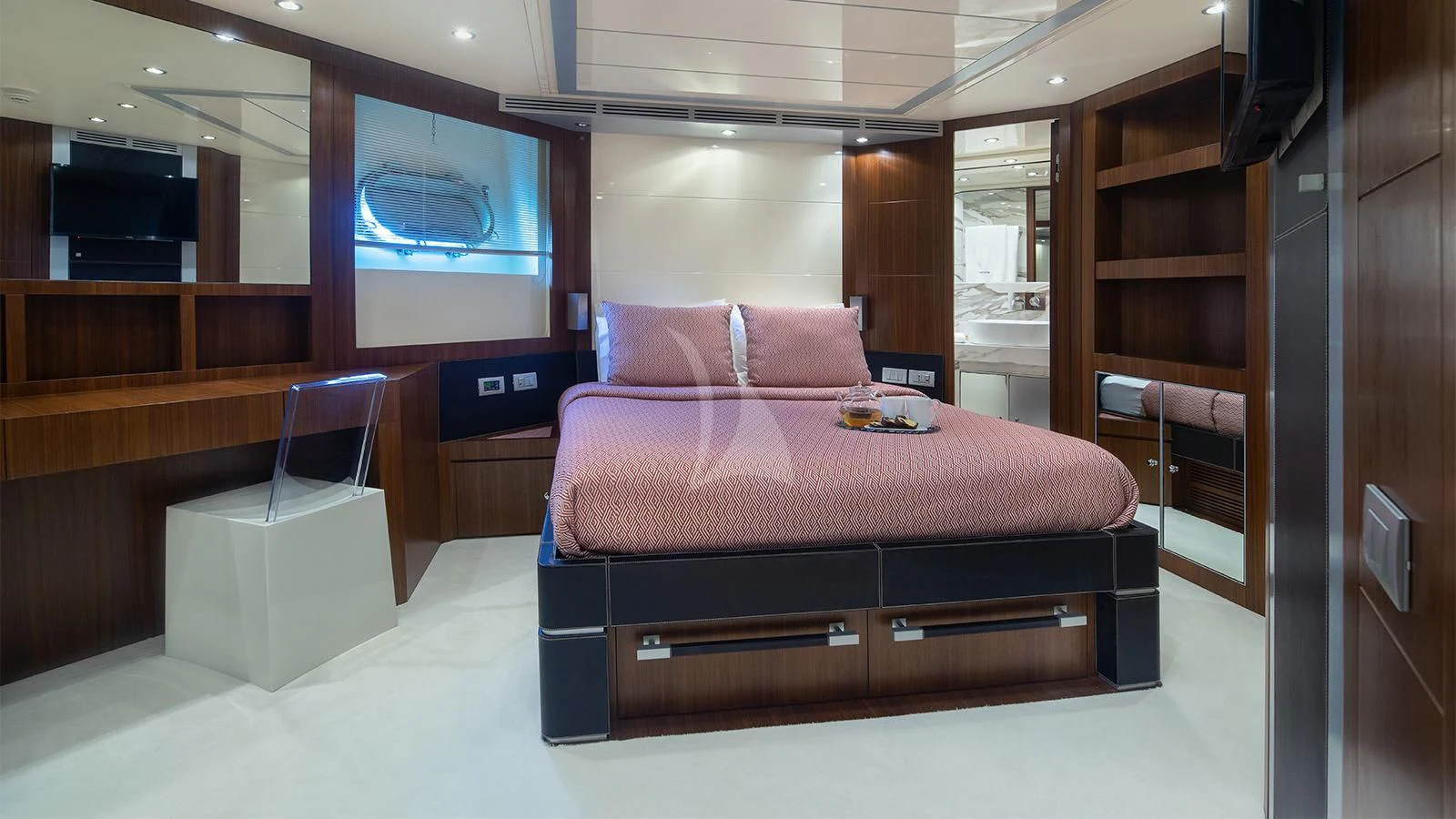 a bed in a room aboard BEYOND Yacht for Charter