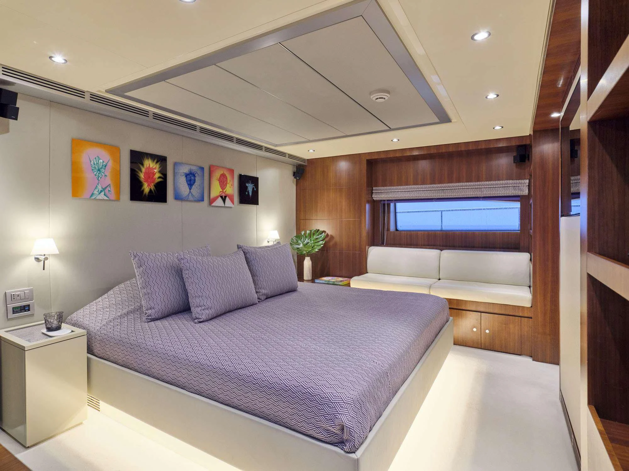 a bed in a room aboard BEYOND Yacht for Charter