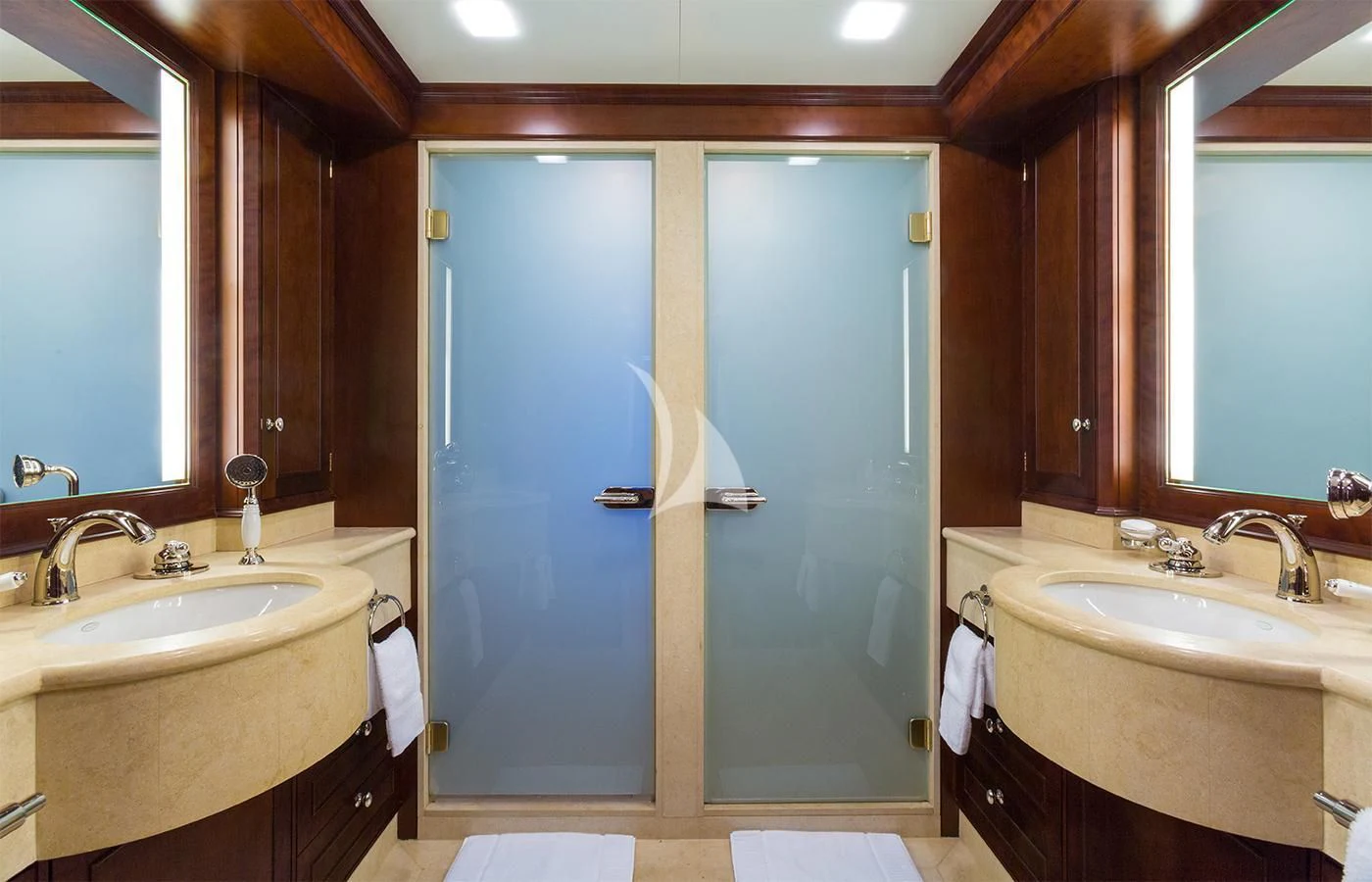 a bathroom with a shower and sink aboard PIONEER Yacht for Sale