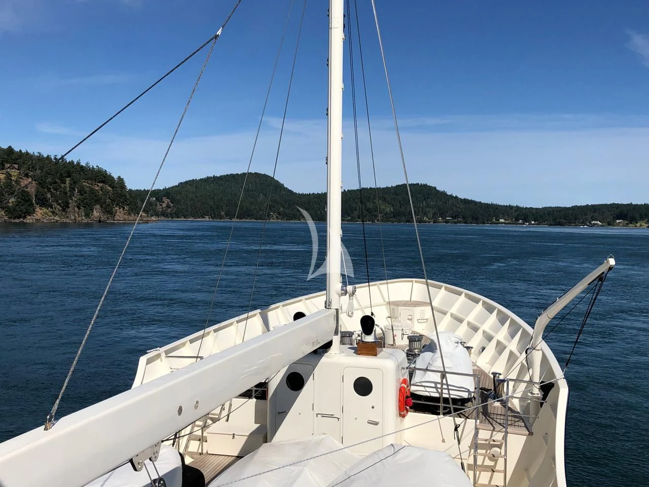 a white boat on the water aboard PIONEER Yacht for Sale