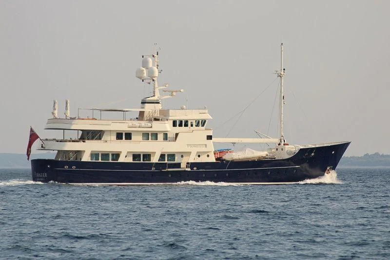 a large boat on the water aboard PIONEER Yacht for Sale