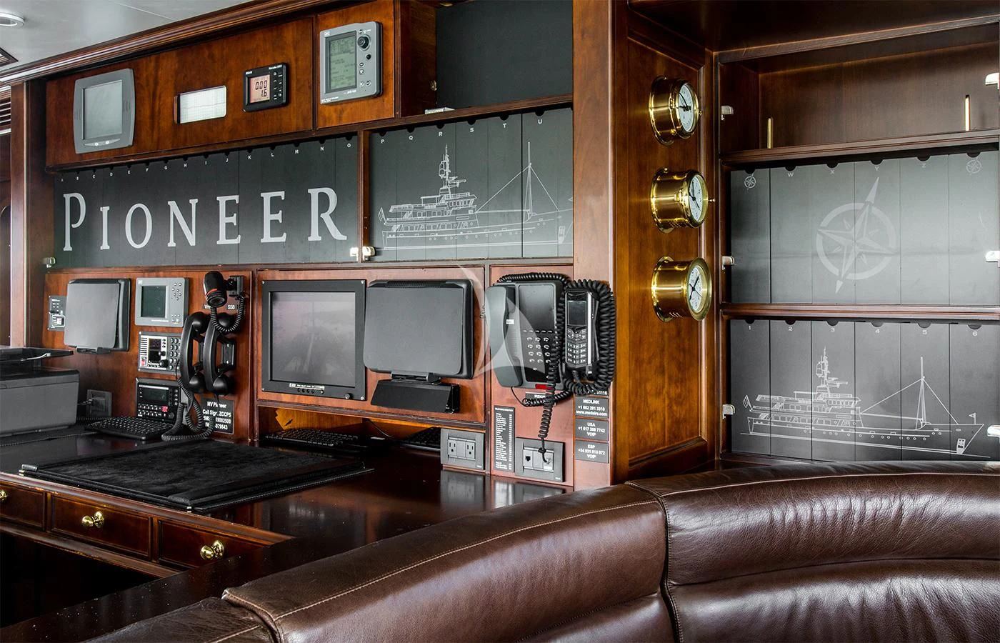 a room with a desk and a computer aboard PIONEER Yacht for Sale