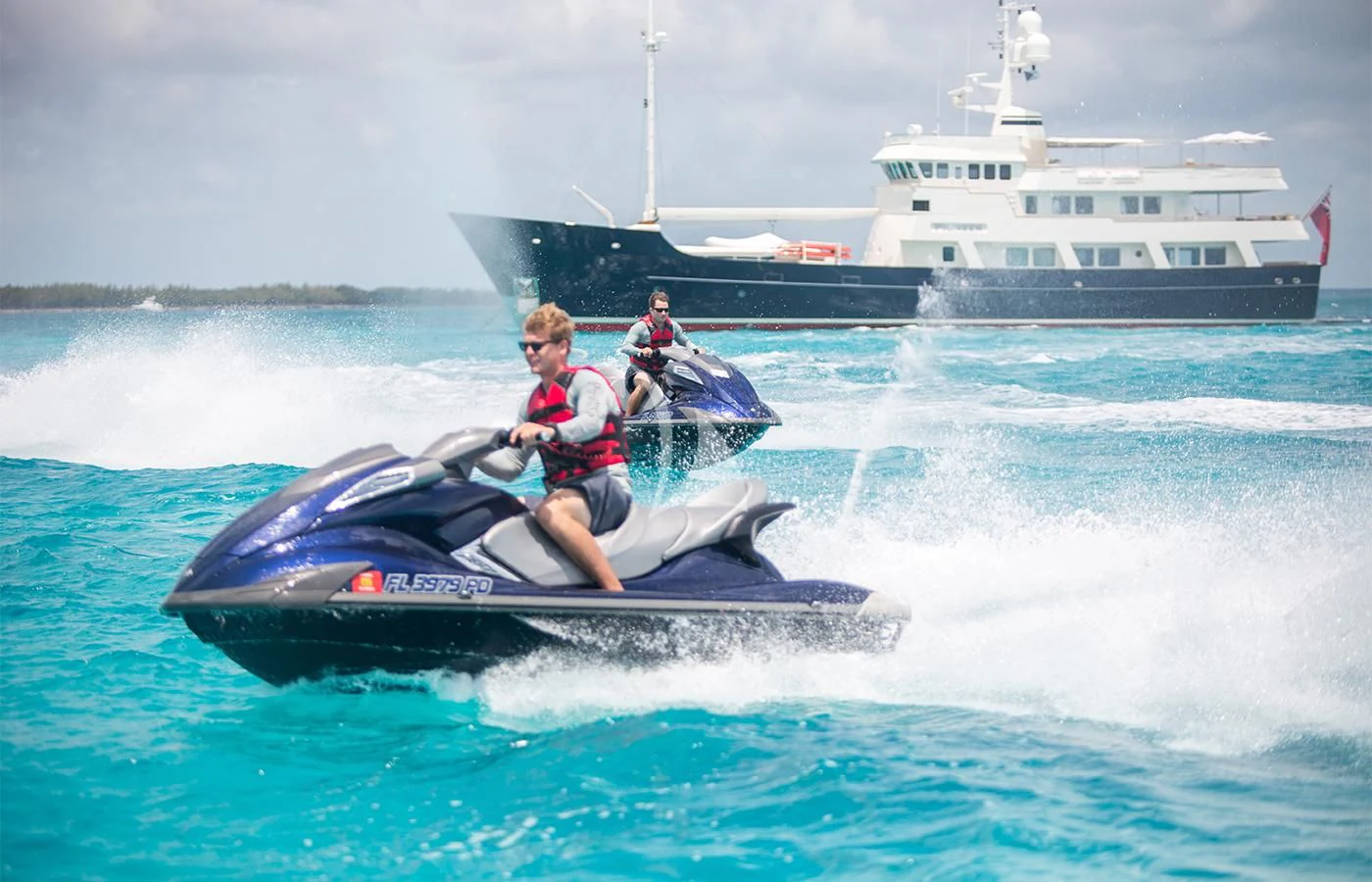a group of people on a boat aboard PIONEER Yacht for Sale