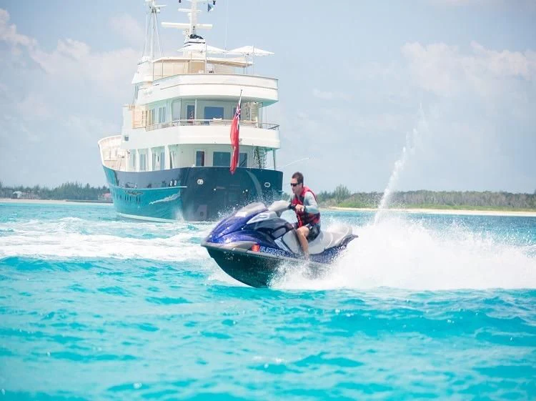 a boat with a person on it aboard PIONEER Yacht for Sale