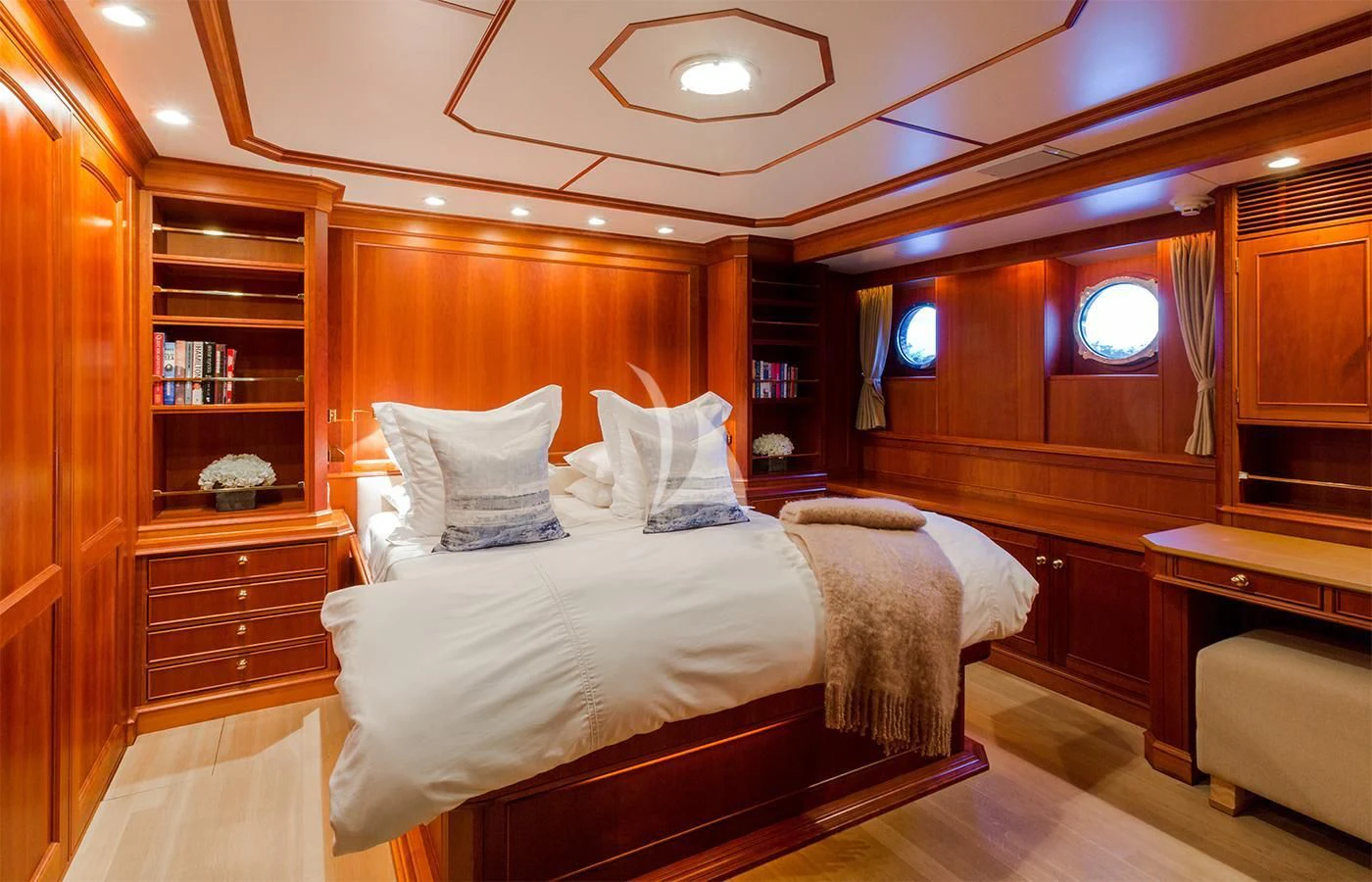 a bed in a room aboard PIONEER Yacht for Sale