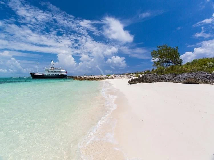 a boat on a beach aboard PIONEER Yacht for Sale