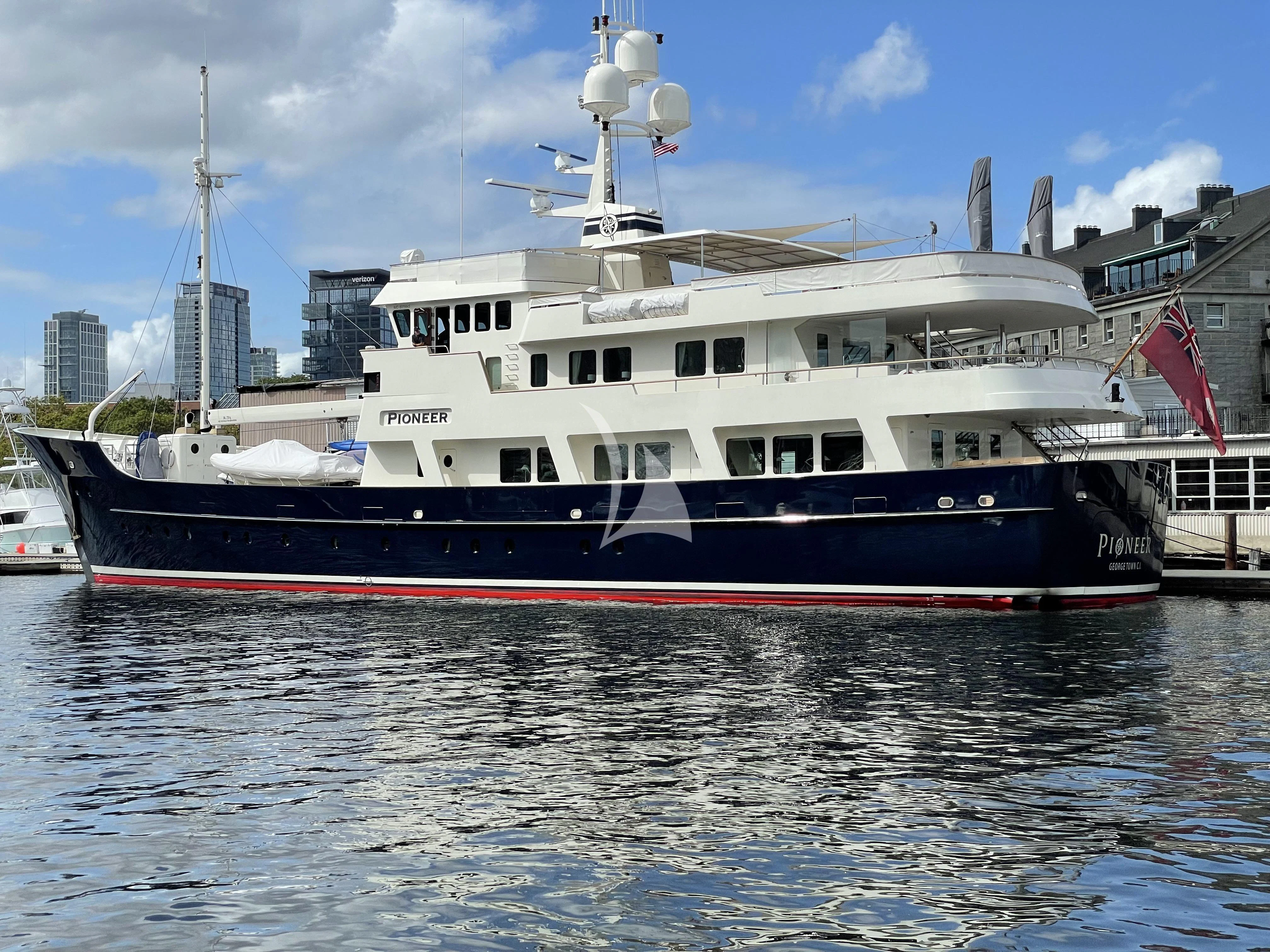 a large boat in the water aboard PIONEER Yacht for Sale