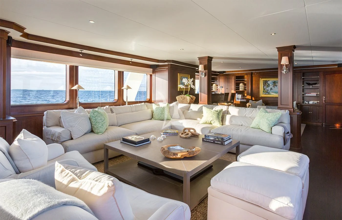 a living room with a large window aboard PIONEER Yacht for Sale