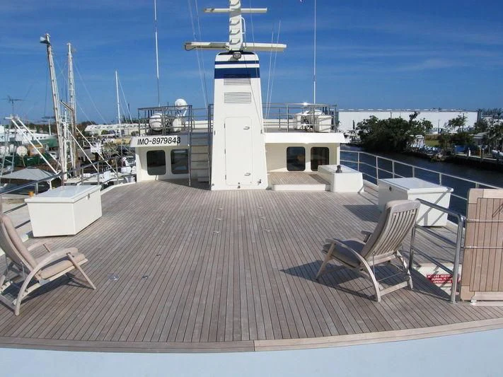 a deck with a white tower and a white building with a white tower aboard PIONEER Yacht for Sale