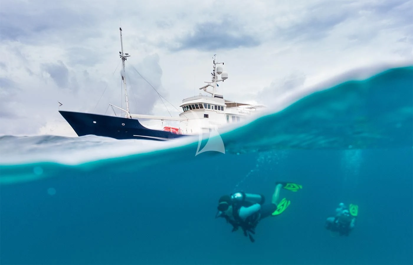 a person in a costume in the ocean aboard PIONEER Yacht for Sale