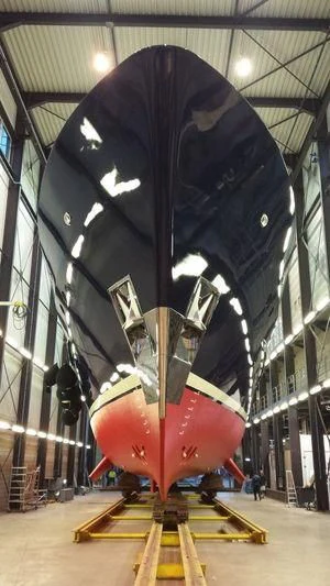 a large black and red metal object aboard PIONEER Yacht for Sale
