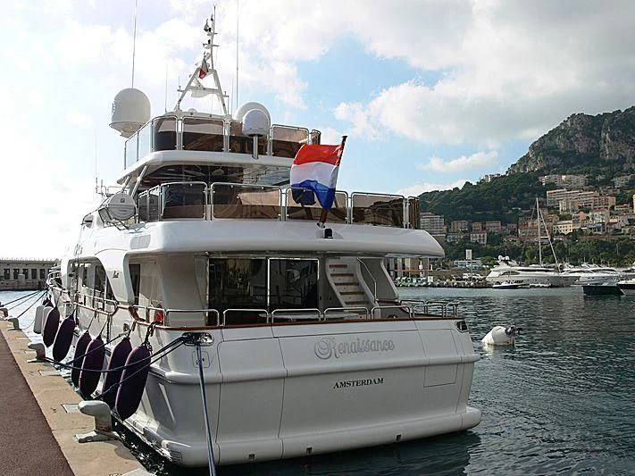 a boat docked at a pier aboard RENAISSANCE Yacht for Sale