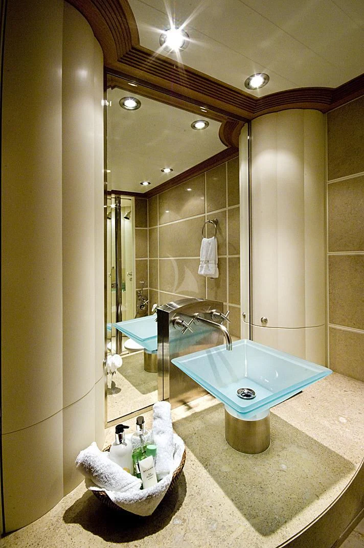 a bathroom with a tub and a sink aboard KIJO Yacht for Sale