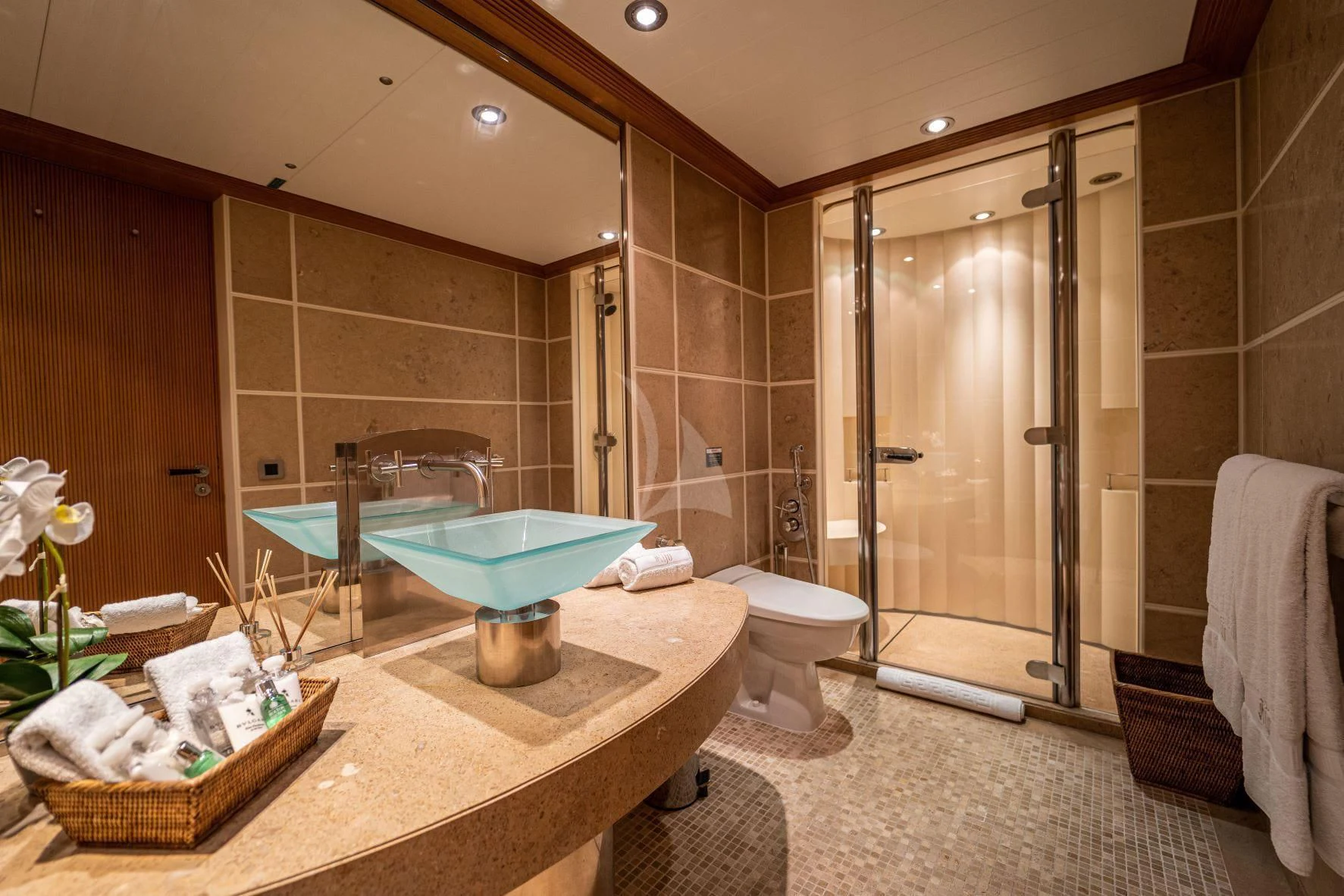 a bathroom with a large glass shower aboard KIJO Yacht for Sale