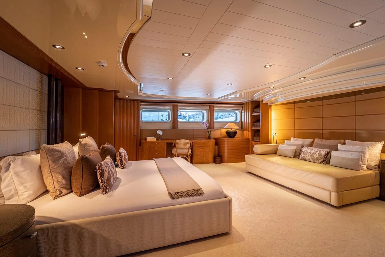 a room with a couch and a tv on the wall aboard KIJO Yacht for Sale