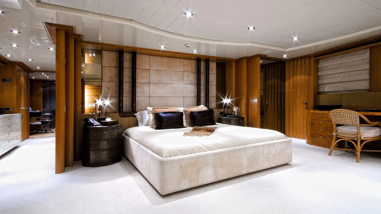 a large bedroom with a large bed aboard KIJO Yacht for Sale