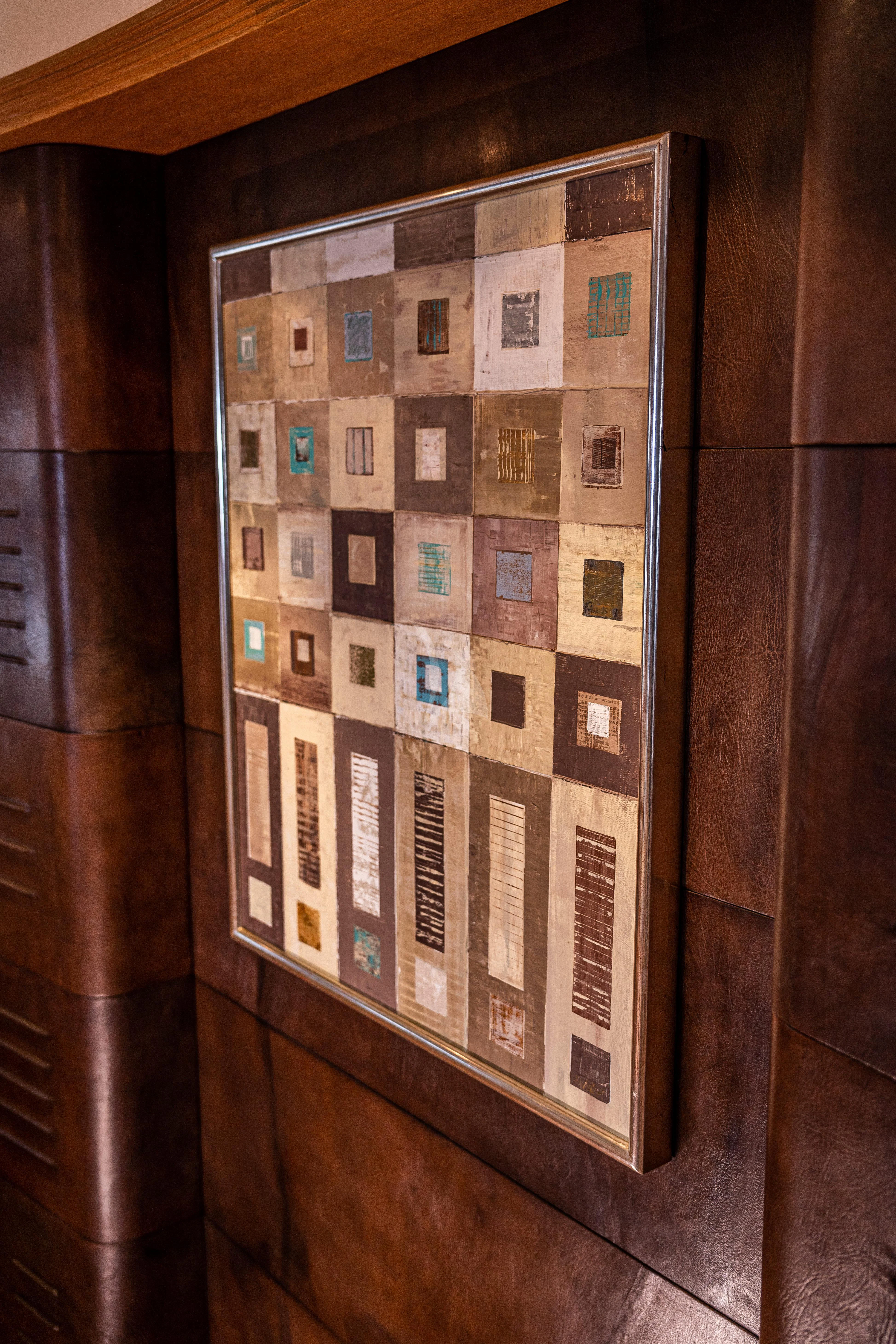 a wood shelf with pictures on it aboard KIJO Yacht for Sale