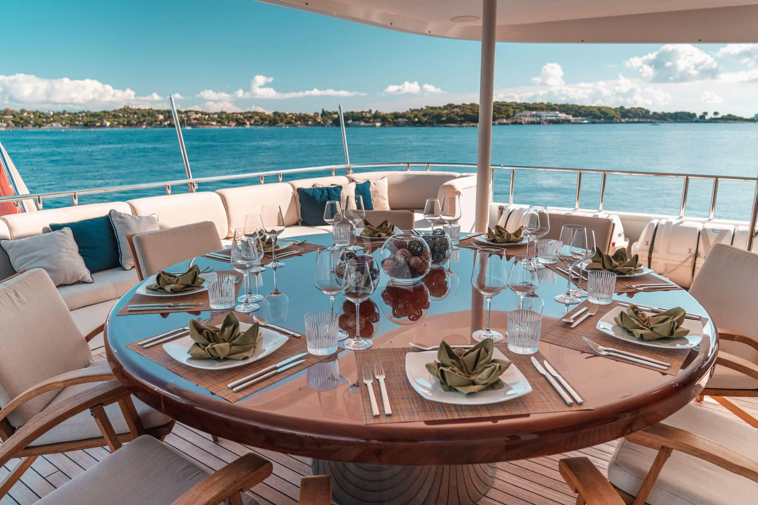 a table set for a dinner aboard KIJO Yacht for Sale