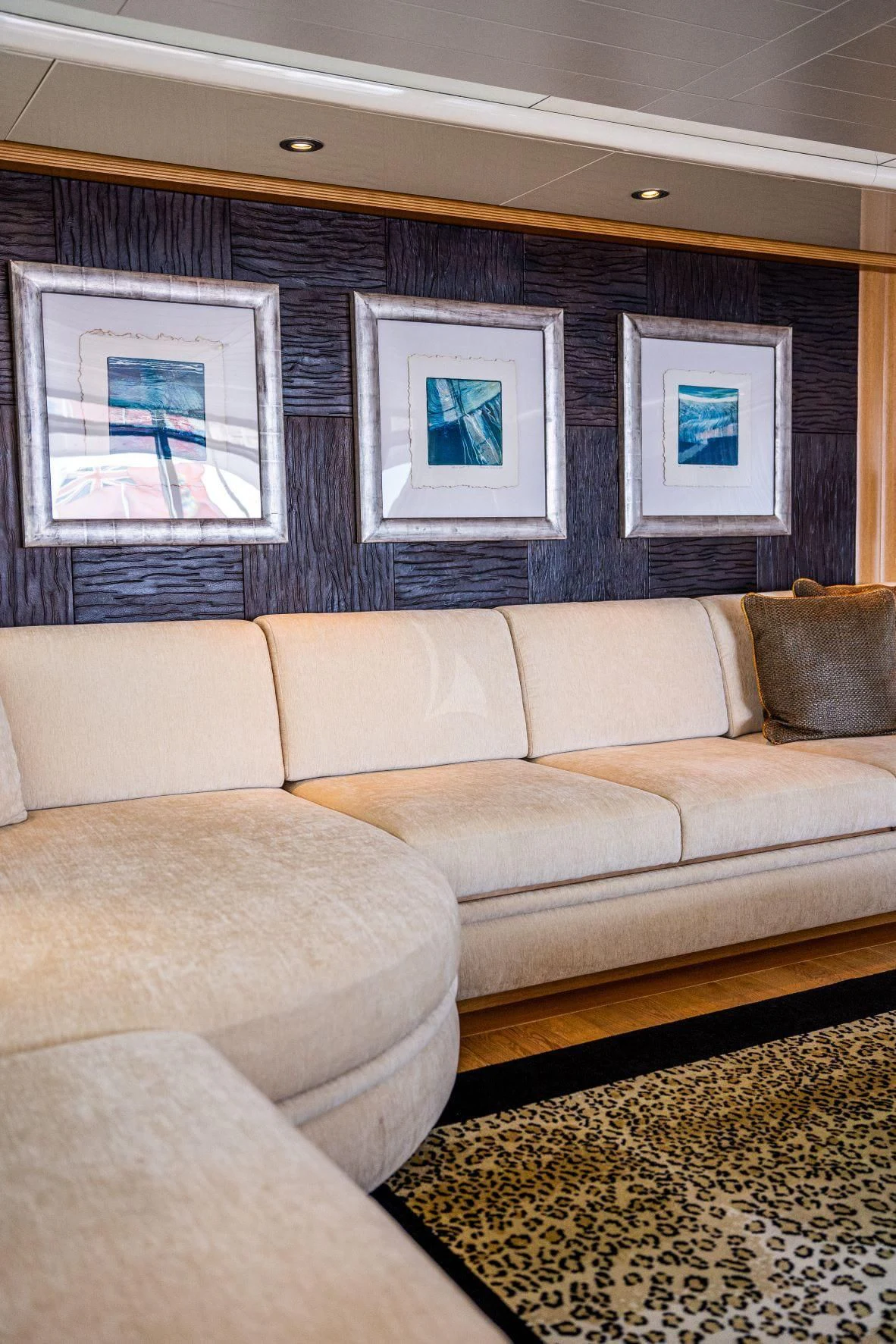 a living room with couches aboard KIJO Yacht for Sale