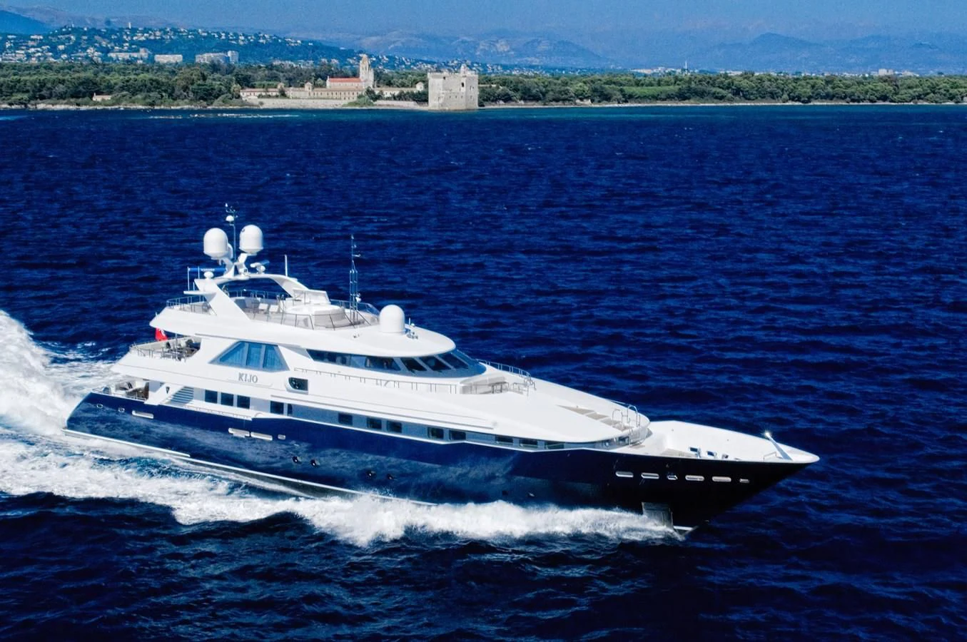 a large white boat on the water aboard KIJO Yacht for Sale