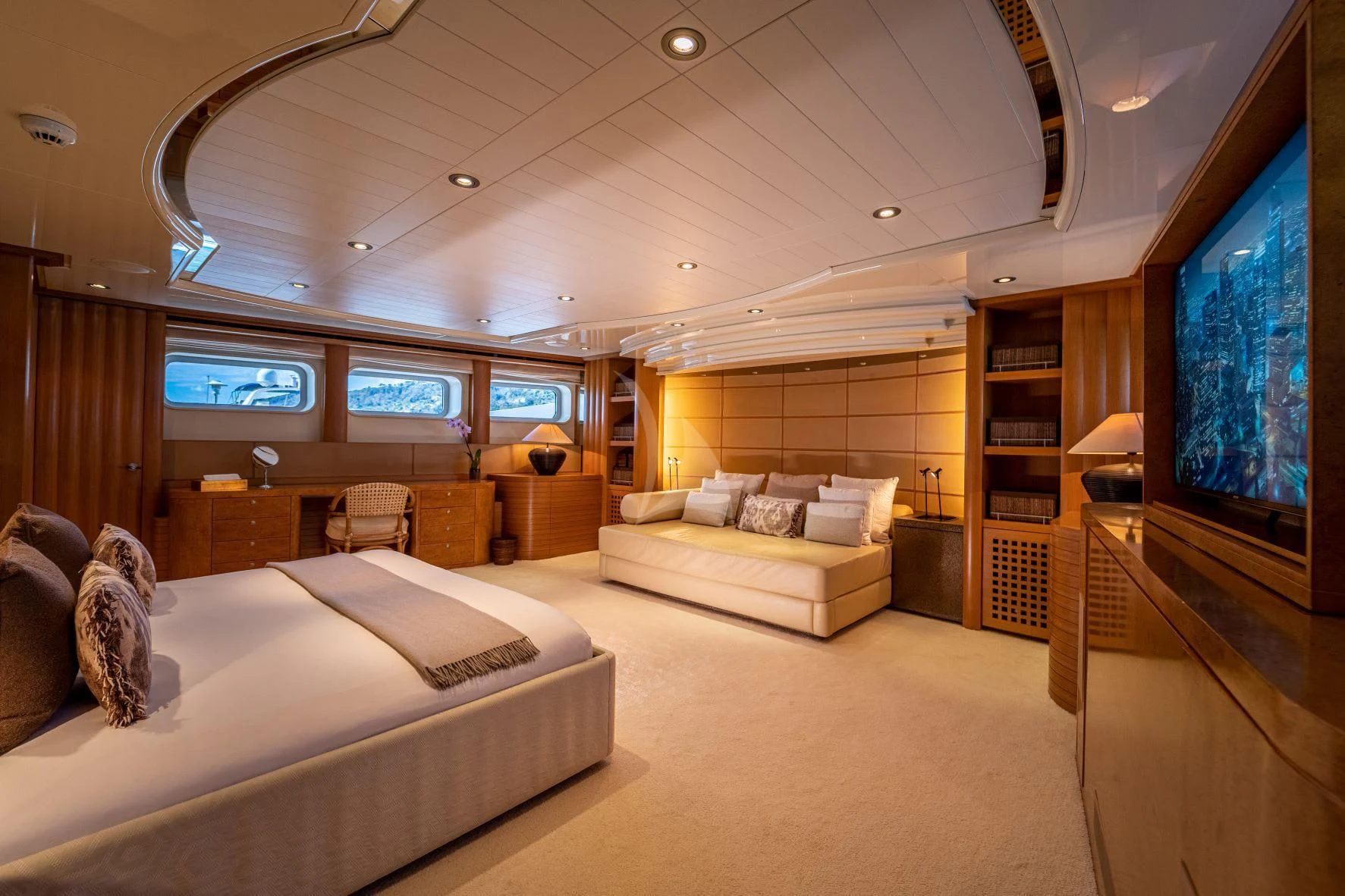 a room with a bed and a tv aboard KIJO Yacht for Sale