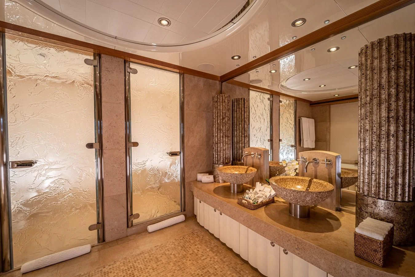 a bathroom with a sink and a mirror aboard KIJO Yacht for Sale