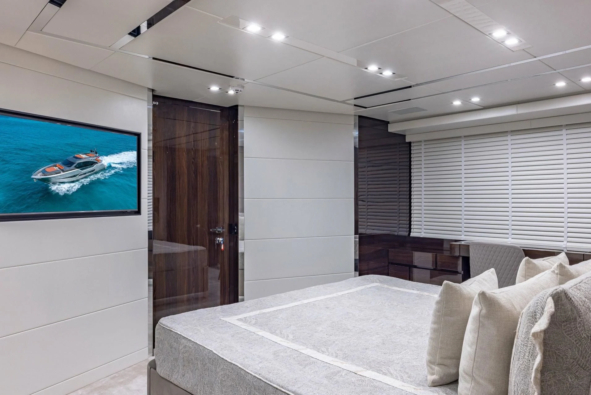 a room with a bed and a television aboard INCENTIVIZED Yacht for Sale