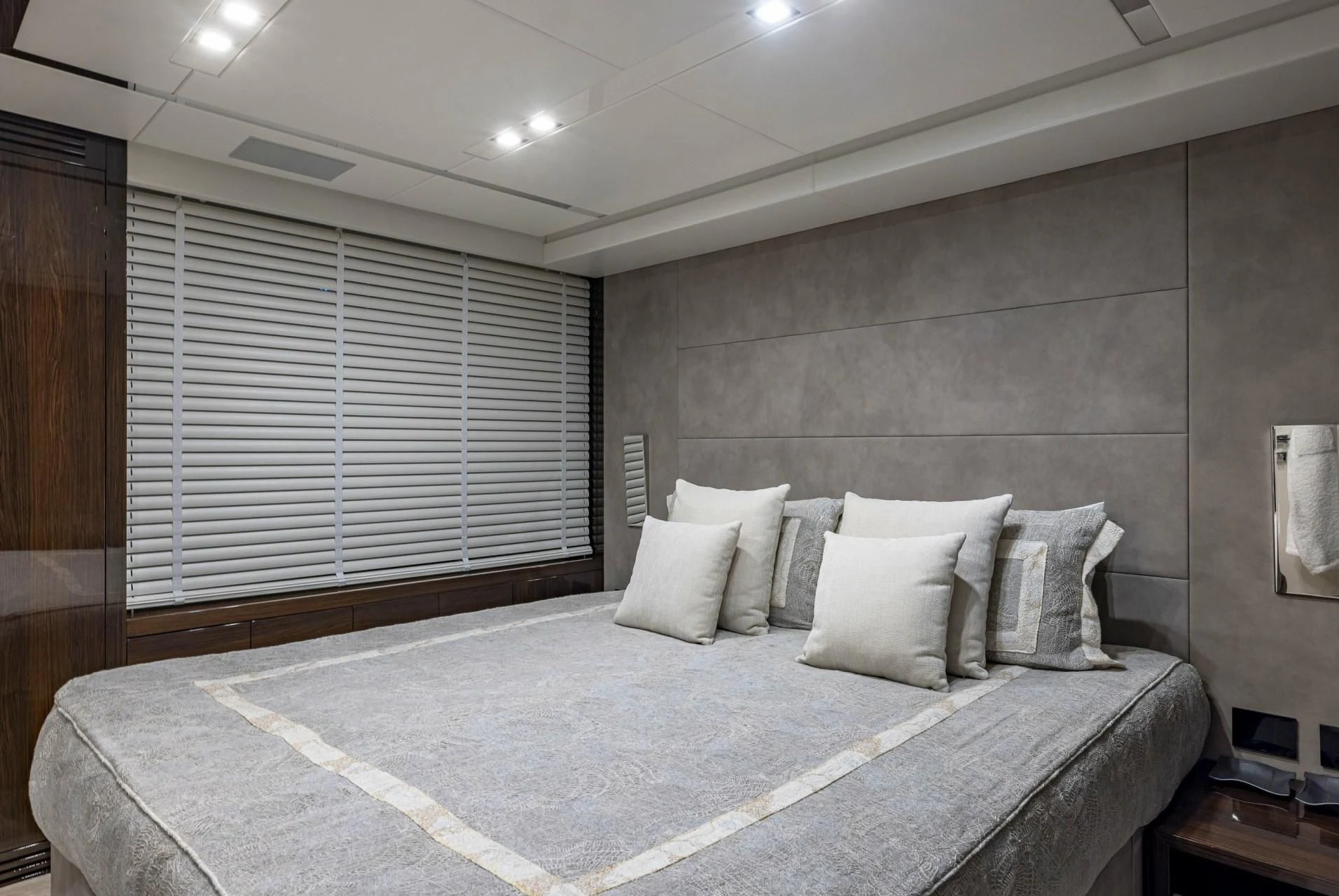 a large bed in a room aboard INCENTIVIZED Yacht for Sale