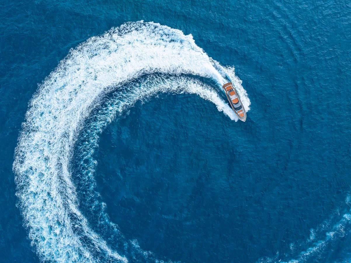 a boat in the water aboard INCENTIVIZED Yacht for Sale