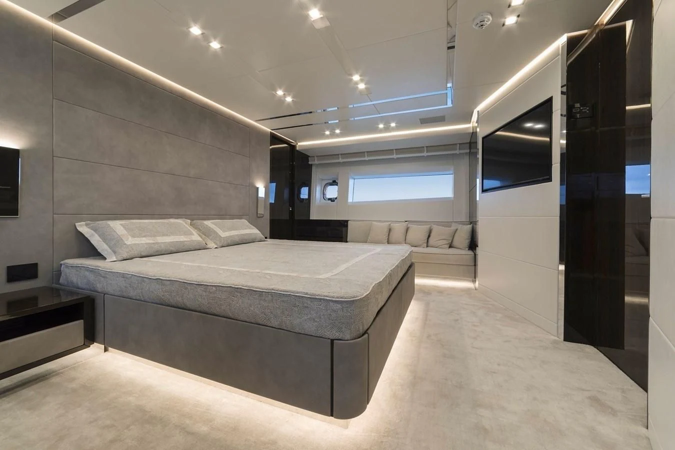 a room with a bed and a window aboard INCENTIVIZED Yacht for Sale