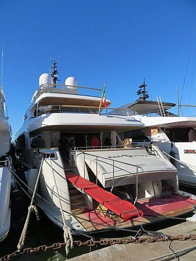 a boat docked at a pier aboard KIA ORA Yacht for Sale