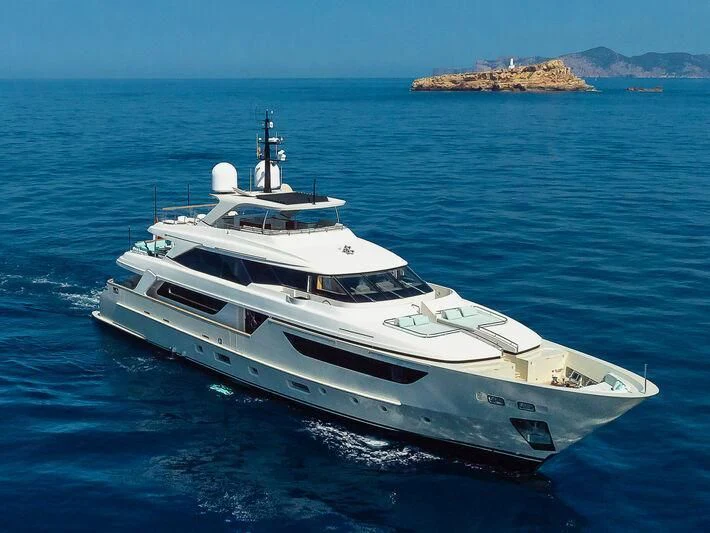 a white yacht in the water aboard KIA ORA Yacht for Sale