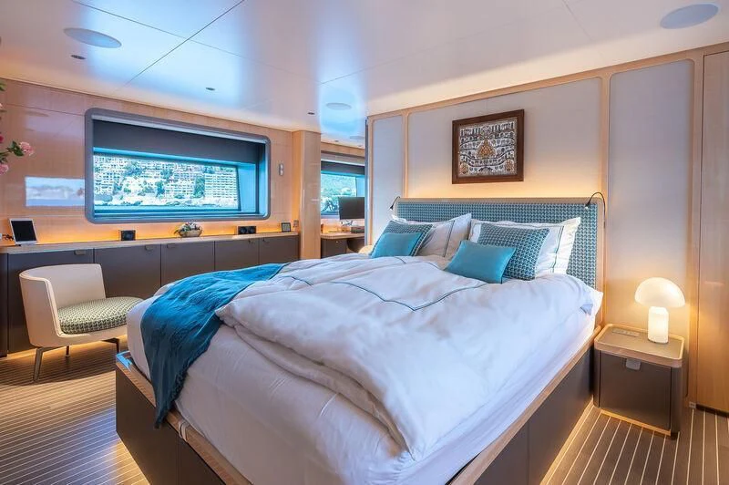 a room with two beds aboard KIA ORA Yacht for Sale