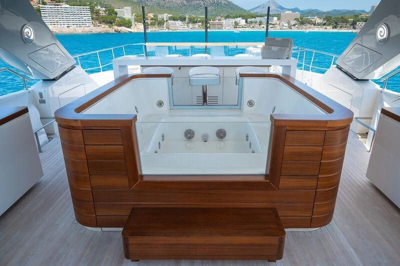 a boat on a deck aboard KIA ORA Yacht for Sale